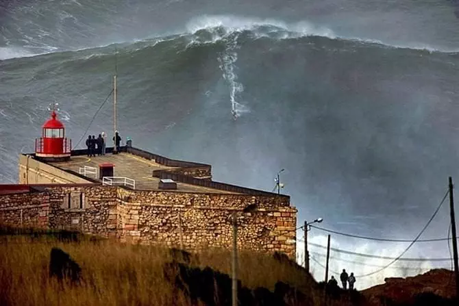 Garrett McNamara surfs 'world record 100ft wave' in Portugal Garrett McNamara surfs 'world record 100ft wave' in Portugal